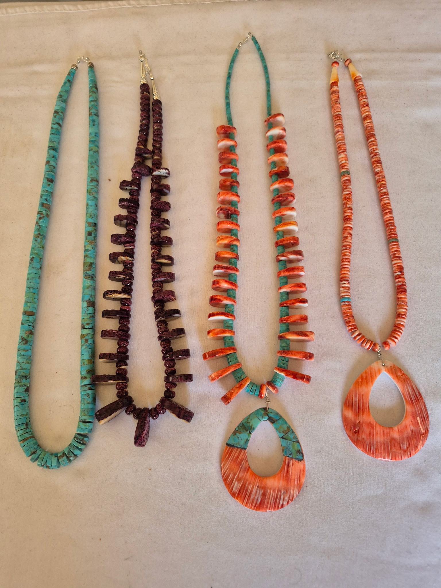 Four handcrafted necklaces